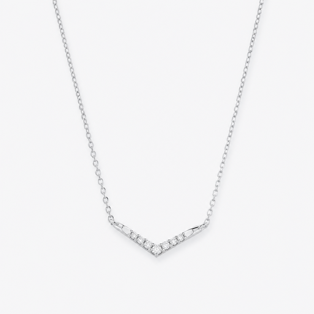 A minimalist women's necklace made of silver with diamond stones. Collier minimaliste simple avec diamant, utilisé des formes ou soit un forme géomérrique pour un côté moderne, en restant delicat et avec des détails léger
photorealistic jewelry design, A minimalist women's necklace made of silver with diamond stones. Collier minimaliste simple avec diamant, utilisé des formes ou soit un forme géomérrique pour un côté moderne, en restant delicat et avec des détails léger, minimalist style, just the design no text