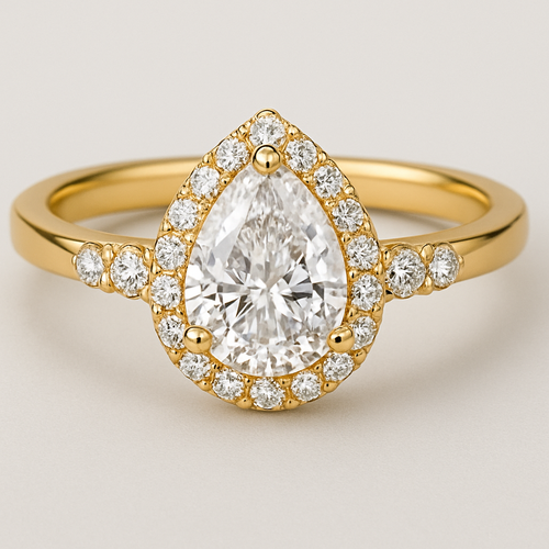 Pear shaped, white diamond , band width 3 mm , gold ring, halo around the diamond and small diamond on the sides of the ring. The diamond on the sides should be together two by two
