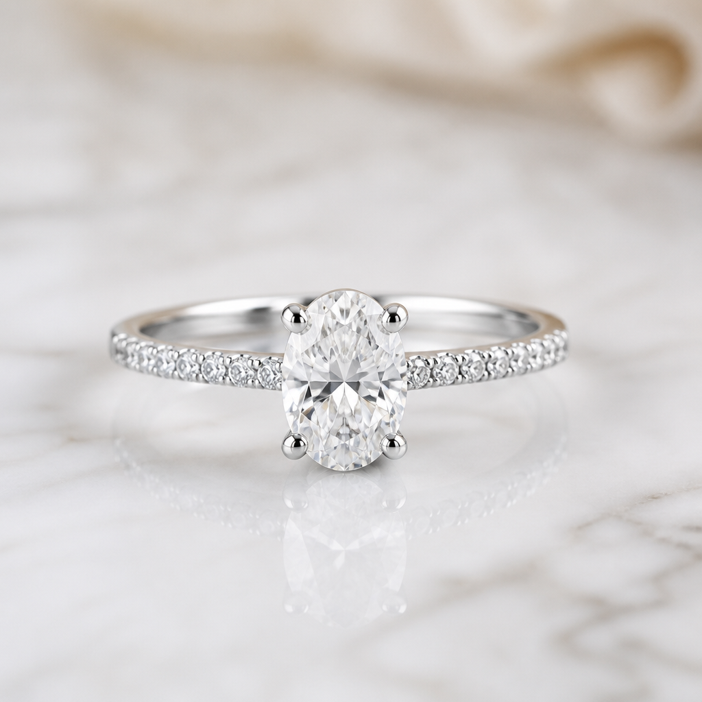 A luxury women's ring made of white gold with diamond stones suitable for wedding, minimalist, simple and delicate, clean lines. A 0.70-carat oval diamond is used as the center stone.
photorealistic jewelry design, A luxury women's ring made of white gold with diamond stones suitable for wedding, minimalist, simple and delicate, clean lines. A 0.70-carat oval diamond is used as the center stone., luxury style, just the design no text