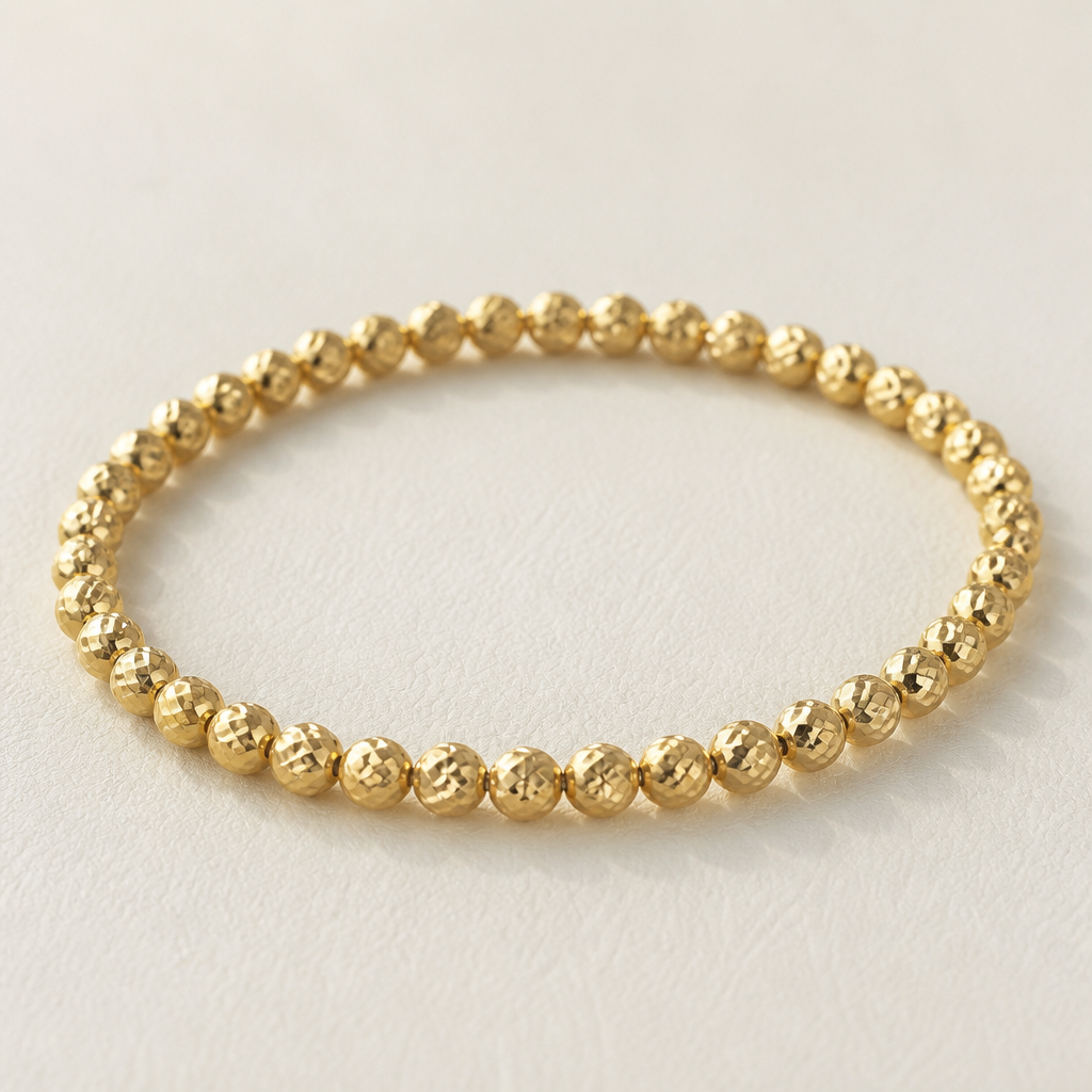 A women's ring. es una pulsera de balines diamantados de oro 18k los tamaños de los balines son tipo 8 tiene aproximadamente 38 balines
photorealistic jewelry design, A women's ring. es una pulsera de balines diamantados de oro 18k los tamaños de los balines son tipo 8 tiene aproximadamente 38 balines, modern style, just the design no text