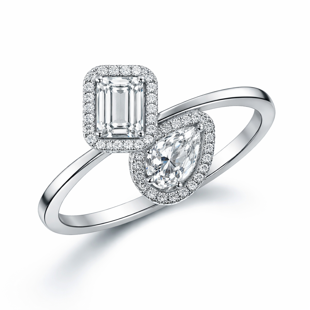 Create a two stones ring in halo setting with emerald cut and pear shap diamond s
