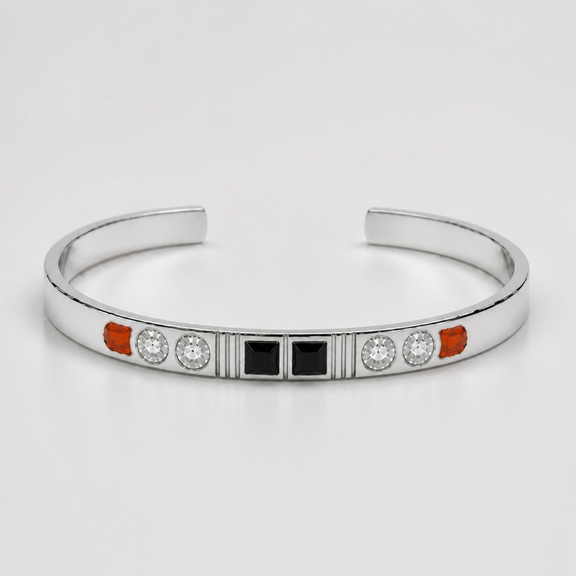 A women's bracelet made of silver. put two black square stones in the gap in the middle and put 4 lines on top of each other between the black stones and the clear stones
using the attached image as a visual reference, create A women's bracelet made of silver. put two black square stones in the gap in the middle and put 4 lines on top of each other between the black stones and the clear stones. photorealistic, just the design no text