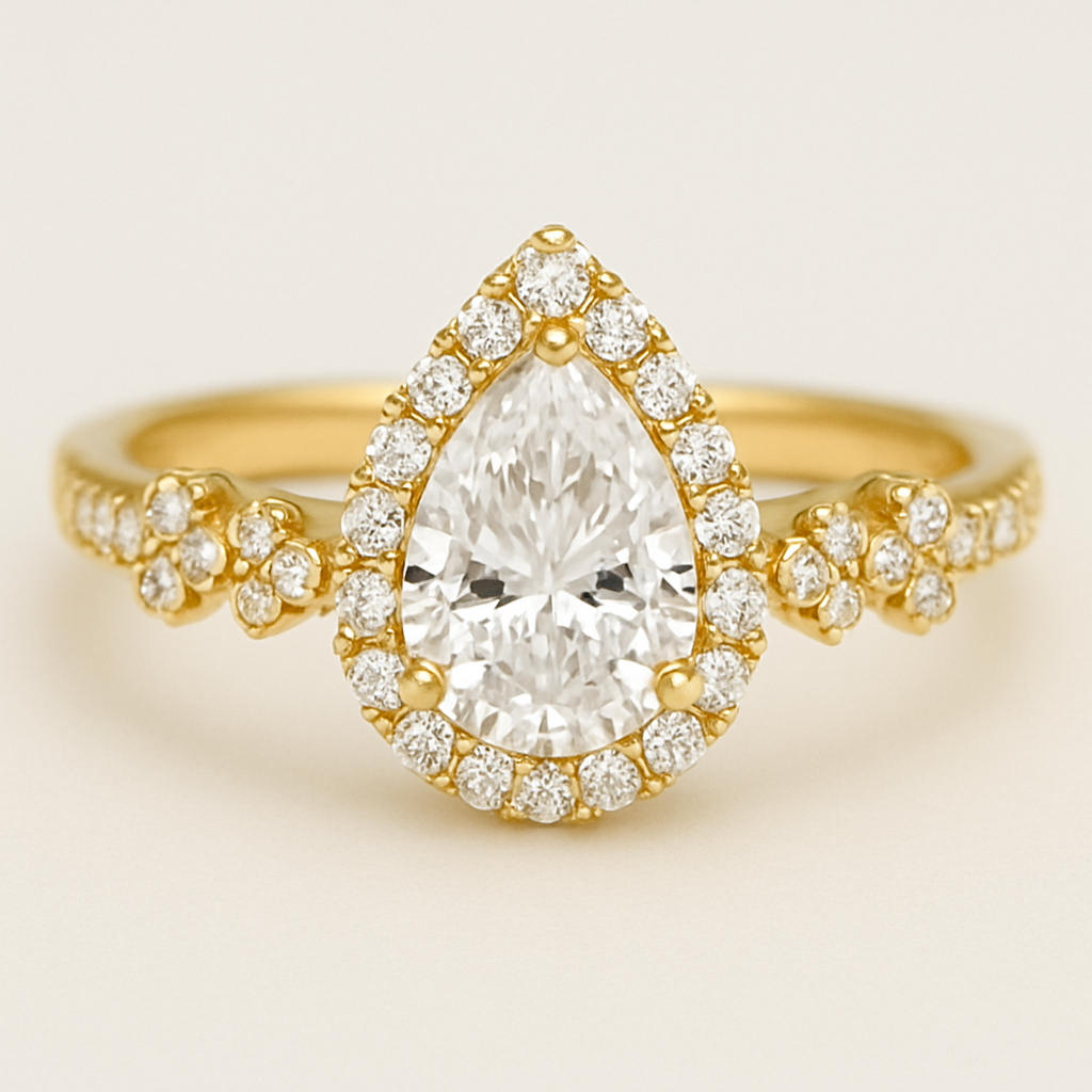 Pear shaped, white diamond , band width 3 mm , gold ring, halo around the diamond and small diamond on the sides of the ring. Diamonds are set in little four-stone flower designs around the band