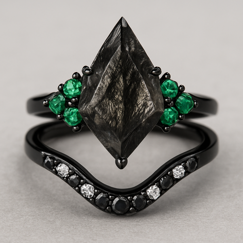 Black band, long kite cut rutilated black quartz upside down, emerald accent stones 3 on each side in a cluster, add a wedding band that curves around main stone with black and white stones