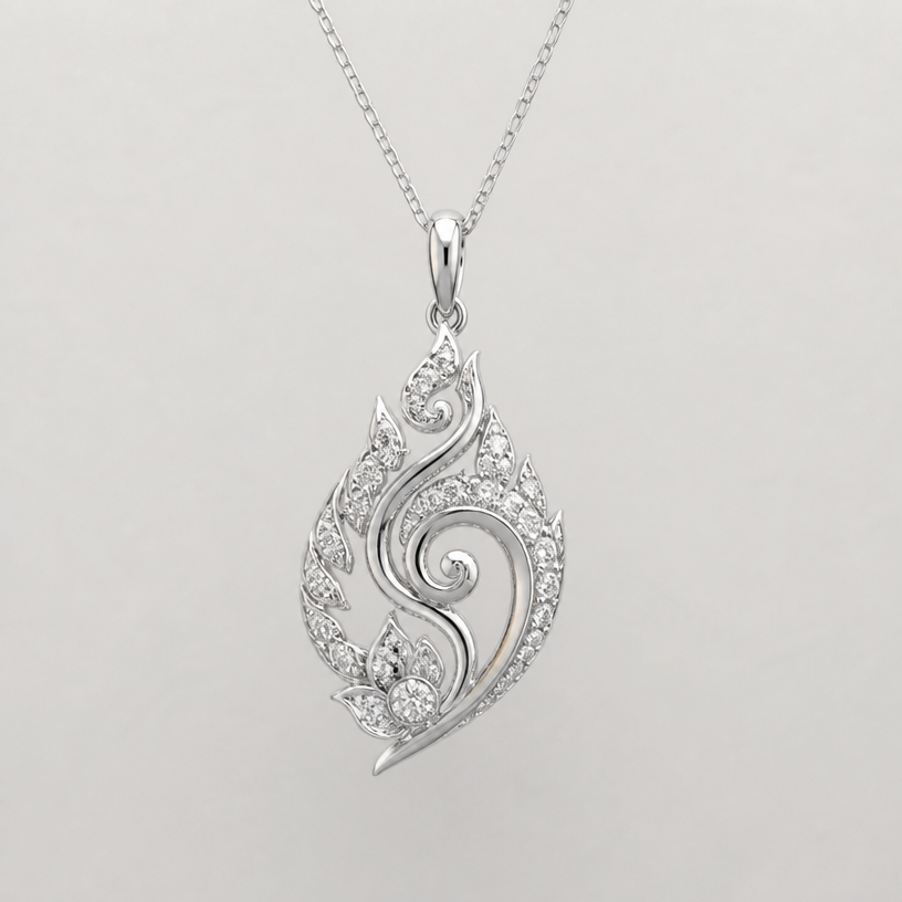 A minimalist women's pendant made of white gold with diamond stones suitable for daily wear, minimalist, simple and delicate, clean lines. เอาลายไทยมาเป็นส่วนประกอบ, cost 300$
using the attached image as a visual reference, create A minimalist women's pendant made of white gold with diamond stones suitable for daily wear, minimalist, simple and delicate, clean lines. เอาลายไทยมาเป็นส่วนประกอบ, cost 300$. photorealistic, just the design no text