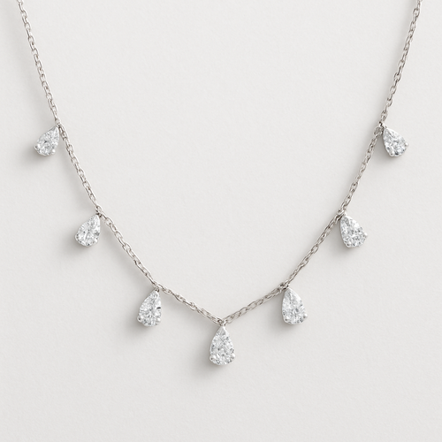 Pear shape pears station necklace 7 diamonds small each diamonds .15 no bezel