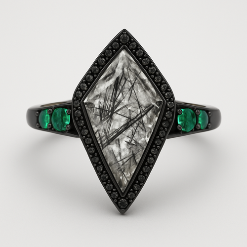 Black band, kite cut tourmalated quartz, emerald accent stones 3 on each side, second band black going around the kite stone with black stones