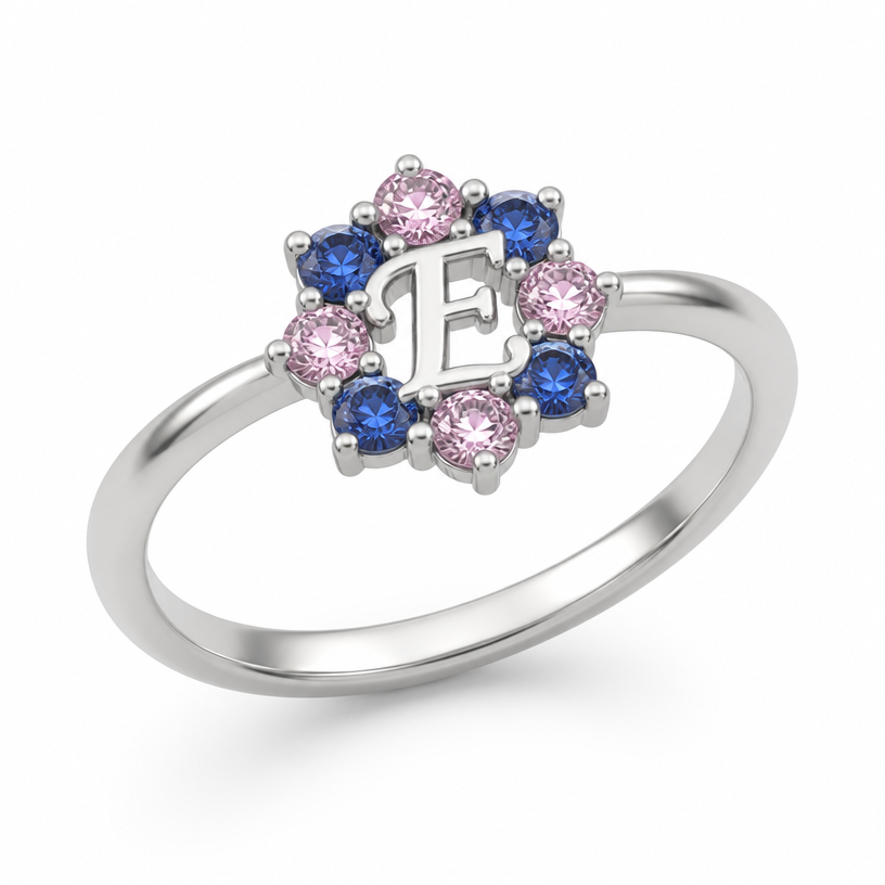 A minimalist women's ring. um anel de 15 anos com inicial E com pedrinhas azul e pedrinhas rosa em volta
using the attached image as a visual reference, create A minimalist women's ring. um anel de 15 anos com inicial E com pedrinhas azul e pedrinhas rosa em volta. photorealistic, just the design no text