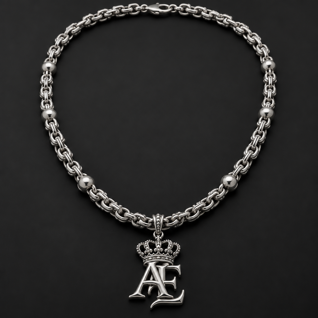 A men's ring. “Create a single 60 cm long necklace based exactly on the reference photo. Keep the same overall design, proportions, arrangement of the decorative elements, pendant and bead placement. The necklace must be ONE continuous necklace, not two necklaces.
The chain links must have the same distinctive, unusual shape and construction as the links shown in the reference photo: small, rounded, oval metal links connected one into another, with a refined and unique handmade-looking link pattern. Do not use a standard simple chain and do not use a Cuban chain. Make these distinctive links approximately 1.8–2 times thicker than in the reference photo, while keeping their original shape and character.
Use polished 925 sterling silver throughout. Keep the spherical silver beads exactly in the same type of positions as the reference. Keep the large AE pendant exactly in the same style: the A and E are physically interlocked/connected, with an ornate royal crown integrated directly above the letters.
Exact necklace length: 60 cm. Make the chain visibly substantial and masculine, but preserve the unique link design from the reference. Do not add any extra chains, Cuban links, crosses, or decorative elements that are not present in the reference.”
photorealistic jewelry design, A men's ring. “Create a single 60 cm long necklace based exactly on the reference photo. Keep the same overall design, proportions, arrangement of the decorative elements, pendant and bead placement. The necklace must be ONE continuous necklace, not two necklaces.
The chain links must have the same distinctive, unusual shape and construction as the links shown in the reference photo: small, rounded, oval metal links connected one into another, with a refined and unique handmade-looking link pattern. Do not use a standard simple chain and do not use a Cuban chain. Make these distinctive links approximately 1.8–2 times thicker than in the reference photo, while keeping their original shape and character.
Use polished 925 sterling silver throughout. Keep the spherical silver beads exactly in the same type of positions as the reference. Keep the large AE pendant exactly in the same style: the A and E are physically interlocked/connected, with an ornate royal crown integrated directly above the letters.
Exact necklace length: 60 cm. Make the chain visibly substantial and masculine, but preserve the unique link design from the reference. Do not add any extra chains, Cuban links, crosses, or decorative elements that are not present in the reference.”, modern style, just the design no text