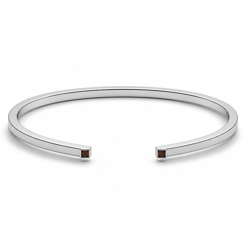 A women's bracelet made of silver, minimalist, simple and delicate, clean lines. make the bracelet 3mm square and the stone also square without changing the design or the place of the stone and the 2 tips of the bracelet are 90°
using the attached image as a visual reference, create A women's bracelet made of silver, minimalist, simple and delicate, clean lines. make the bracelet 3mm square and the stone also square without changing the design or the place of the stone and the 2 tips of the bracelet are 90°. photorealistic, just the design no text