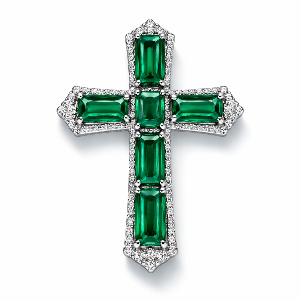 Emerald white gold cross and with simple diamond accent stones. Timeless, elegant, and classy. Hidden bail. Light metal work.