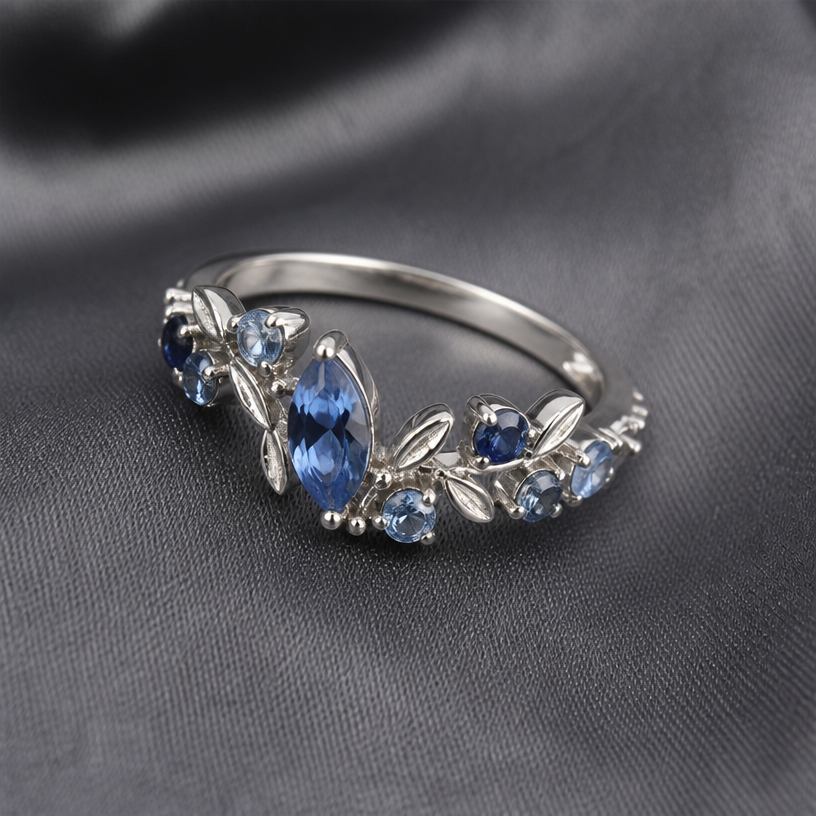 A women's ring with sapphire stones
using the attached image as a visual reference, create A women's ring with sapphire stones. photorealistic, just the design no text