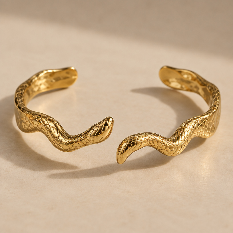 Mettre le tour du bracelet sous forme de couleuvre car c’est un animal totem et que le H ne soit pas formé ainsi que les deux traits soient séparés distinctement et que sa forme ne soit pas parfaitement alignée verticalement
edit the attached jewelry design with these instructions: Mettre le tour du bracelet sous forme de couleuvre car c’est un animal totem et que le H ne soit pas formé ainsi que les deux traits soient séparés distinctement et que sa forme ne soit pas parfaitement alignée verticalement. keep it photorealistic, just the design no text