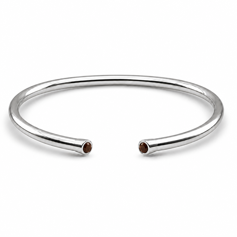 A women's bracelet made of silver, minimalist, simple and delicate, clean lines. same bracelet as the reference photo but the stones are brown agate
using the attached image as a visual reference, create A women's bracelet made of silver, minimalist, simple and delicate, clean lines. same bracelet as the reference photo but the stones are brown agate. photorealistic, just the design no text