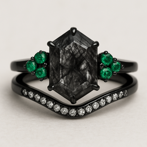 Black band, medium long hexagon cut rutilated black quartz, emerald accent stones 3 on each side in a cluster, add a wedding band that curves with black and white stones