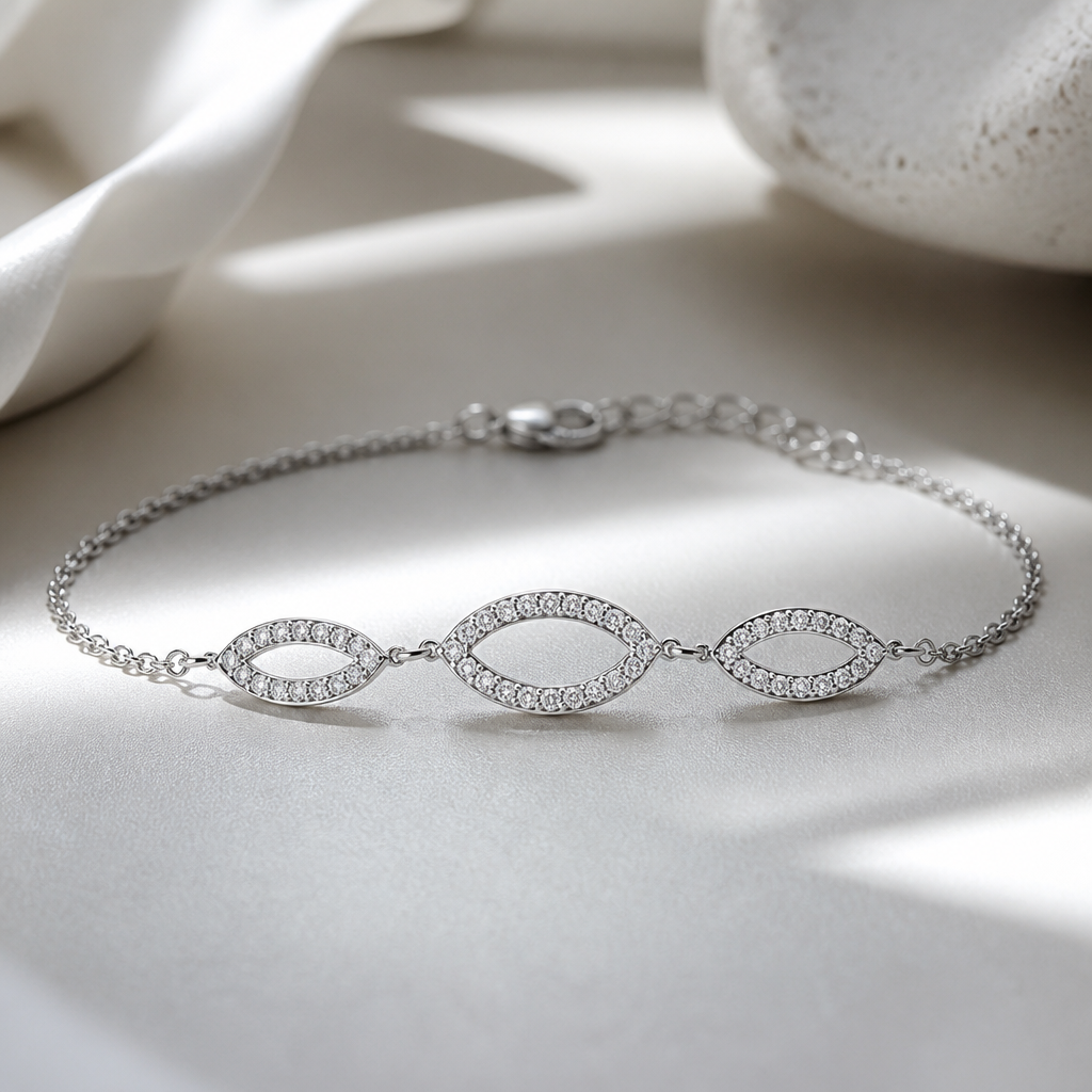 A women's bracelet made of silver with diamond stones. bracelet avec design 3 oval couché peut inclure marquise de metal fin avec chaine minimaliste, jaime les espaces vide
photorealistic jewelry design, A women's bracelet made of silver with diamond stones. bracelet avec design 3 oval couché peut inclure marquise de metal fin avec chaine minimaliste, jaime les espaces vide, modern style, just the design no text