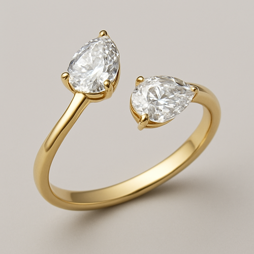 Design a toi ET moi with two pear shaped diamonds 