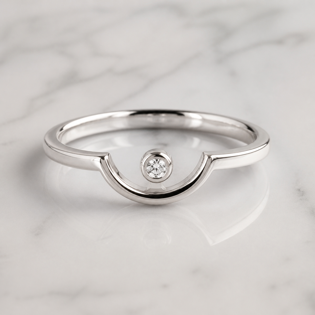 A minimalist women's ring made of silver with diamond stones. inspiration cancer du sein, anneau avec demi rond simple avec petit diamant sur le dessus
photorealistic jewelry design, A minimalist women's ring made of silver with diamond stones. inspiration cancer du sein, anneau avec demi rond simple avec petit diamant sur le dessus, minimalist style, just the design no text