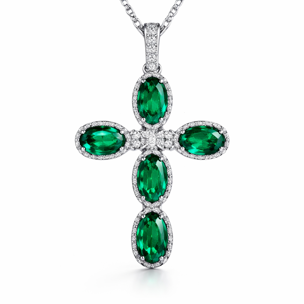 Oval cut emerald cross, white gold, diamond accent stones, minimal metal work