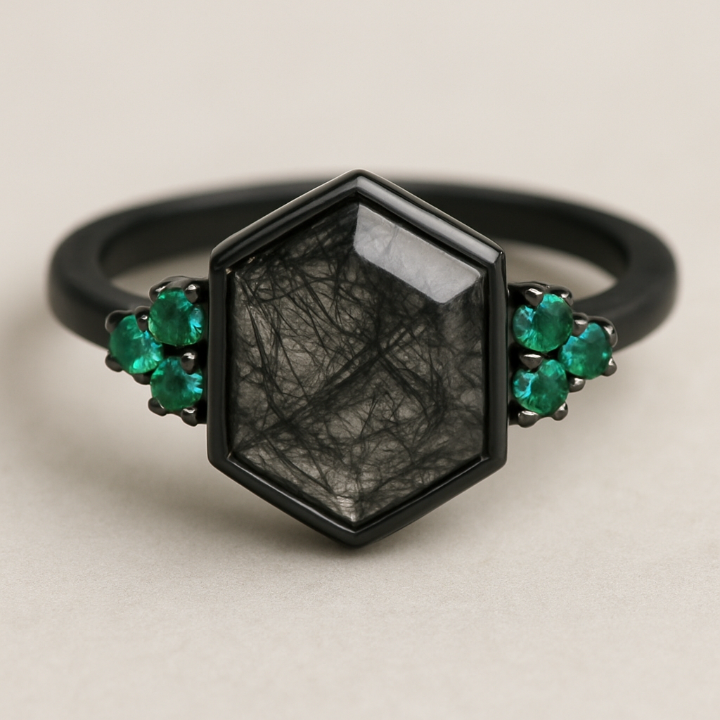Black band, hexagon cut rutilated black quartz, emerald accent stones 3 on each side in a cluster 