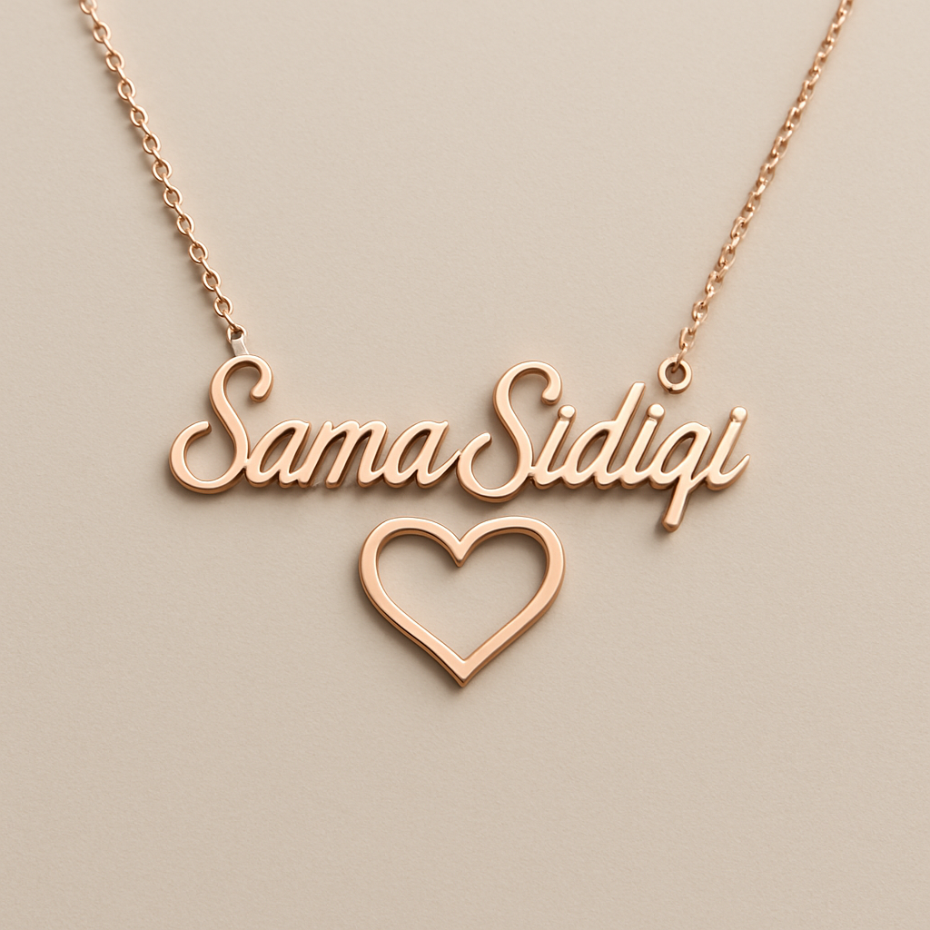 A rose gold necklace that says “Sama Sidiqi” in cursive with a heart shape under it 