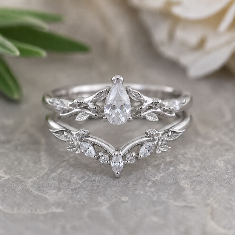 Make the main stone of the upper ring smaller, keep all other details
edit the attached jewelry design with these instructions: Make the main stone of the upper ring smaller, keep all other details. keep it photorealistic, just the design no text