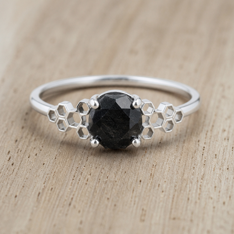 A women's ring made of silver, minimalist, simple and delicate, clean lines. take this black onyx and make some honeycomb outside the stone on either side
using the attached image as a visual reference, create A women's ring made of silver, minimalist, simple and delicate, clean lines. take this black onyx and make some honeycomb outside the stone on either side. photorealistic, just the design no text