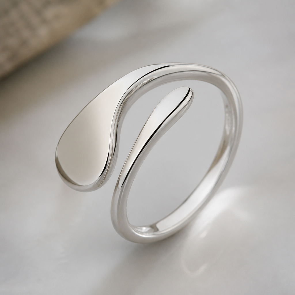 A modern women's ring made of silver
photorealistic jewelry design, A modern women's ring made of silver, modern style, just the design no text