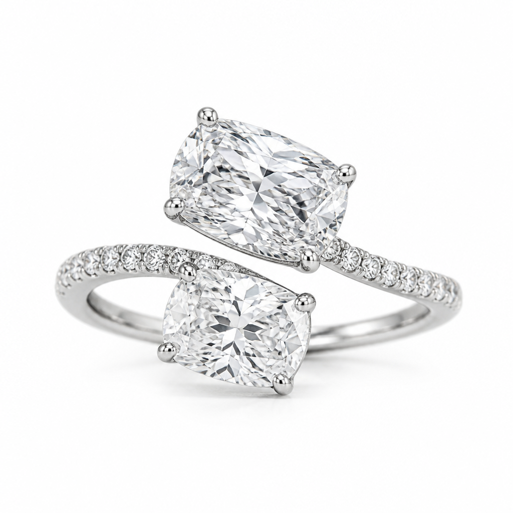 Crest a bypass Toi et Moi ring with a 2.5 carat elongated cushion cut diamond going east to west at an angle and a 1.5 carat cushion cut also at an angle running parallel to each other in white gold pave setting
photorealistic jewelry design, Crest a bypass Toi et Moi ring with a 2.5 carat elongated cushion cut diamond going east to west at an angle and a 1.5 carat cushion cut also at an angle running parallel to each other in white gold pave setting , minimalist style, just the design no text