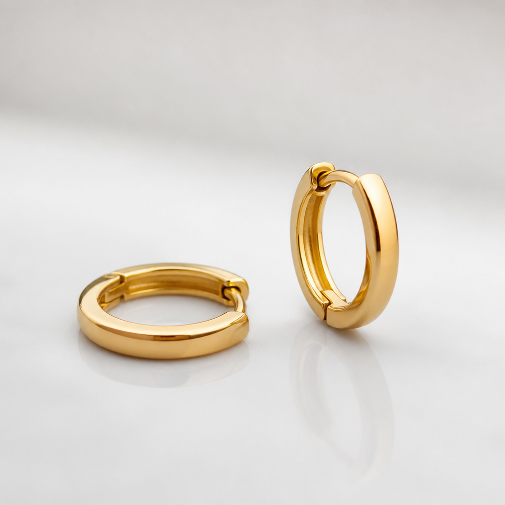 Gold Huggies small earrings simple round design
photorealistic jewelry design, Gold Huggies small earrings simple round design, modern style, just the design no text
