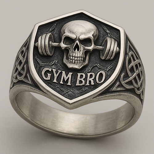 Silver signet ring with angle  skull with barbell with gym bro stamped at the bottom in fancy letters 
