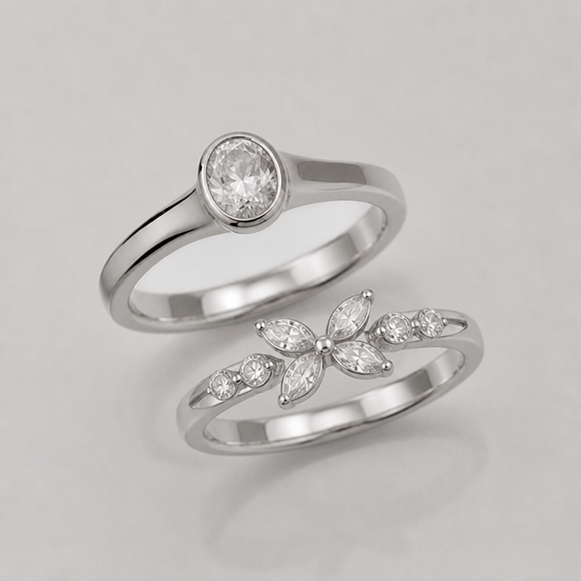 Ring comes as a set which matches with a second ring with floral petals and small stones
edit the attached jewelry design with these instructions: Ring comes as a set which matches with a second ring with floral petals and small stones. keep it photorealistic, just the design no text