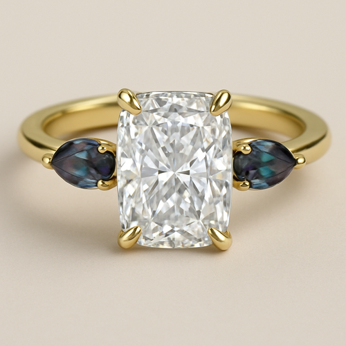 2 carat elongated cushion cut diamond engagement ring with double claw prongs in yellow gold ring with marquise shaped alexandrite side stones 