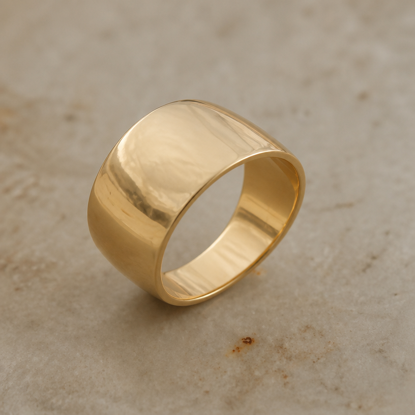 A luxury women's ring made of gold, minimalist, simple and delicate, clean lines. taper this ring more at the bottom
using the attached image as a visual reference, create A luxury women's ring made of gold, minimalist, simple and delicate, clean lines. taper this ring more at the bottom. photorealistic, just the design no text