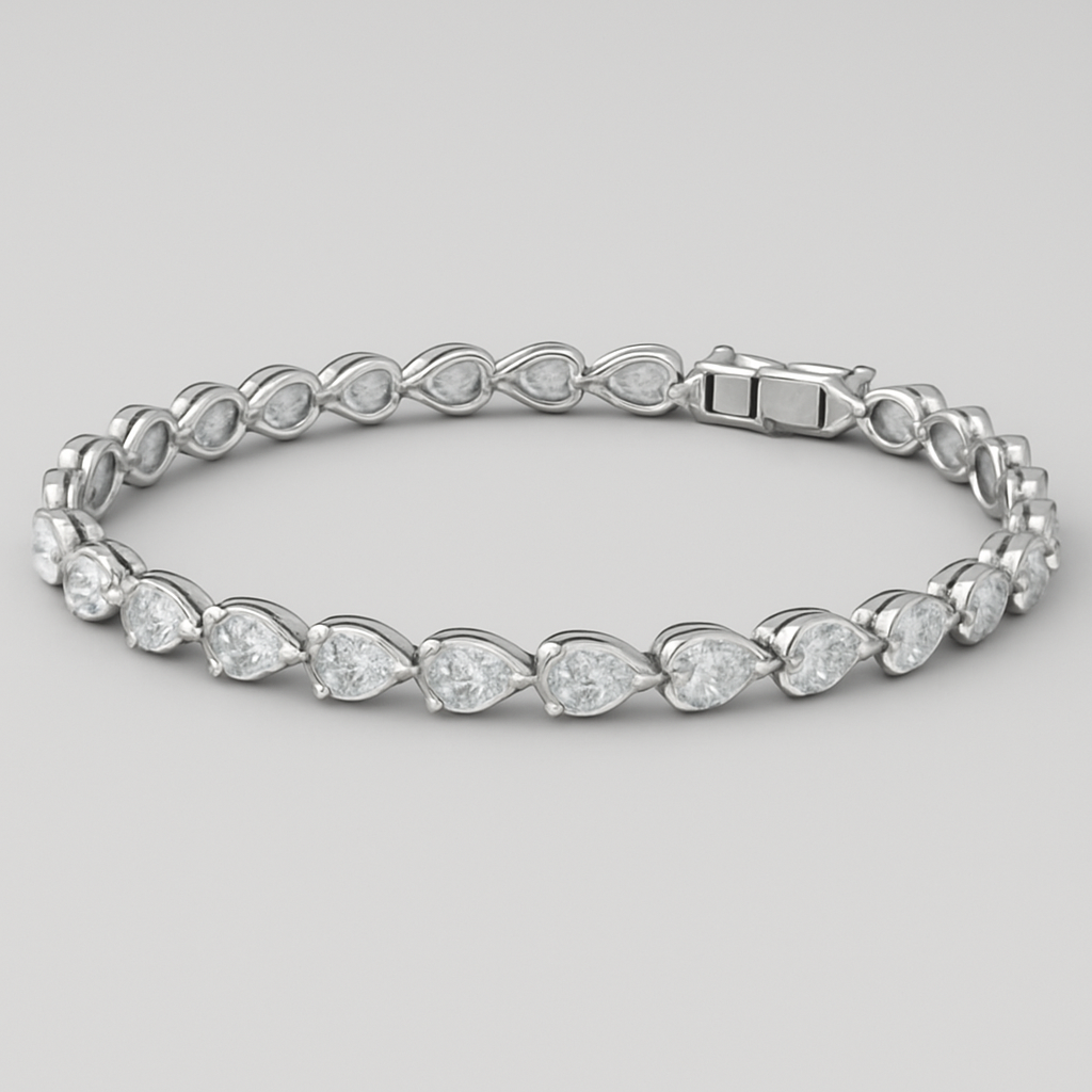 CAD model of a delicate tennis bracelet with pear-shaped diamonds laying on their sides, all pointing left. Each teardrop diamond is set horizontally along a thin white gold chain, forming a smooth continuous flow. Small elegant proportions, precise prong settings, evenly spaced stones, realistic curvature around the wrist. Designed for fine jewelry production.”