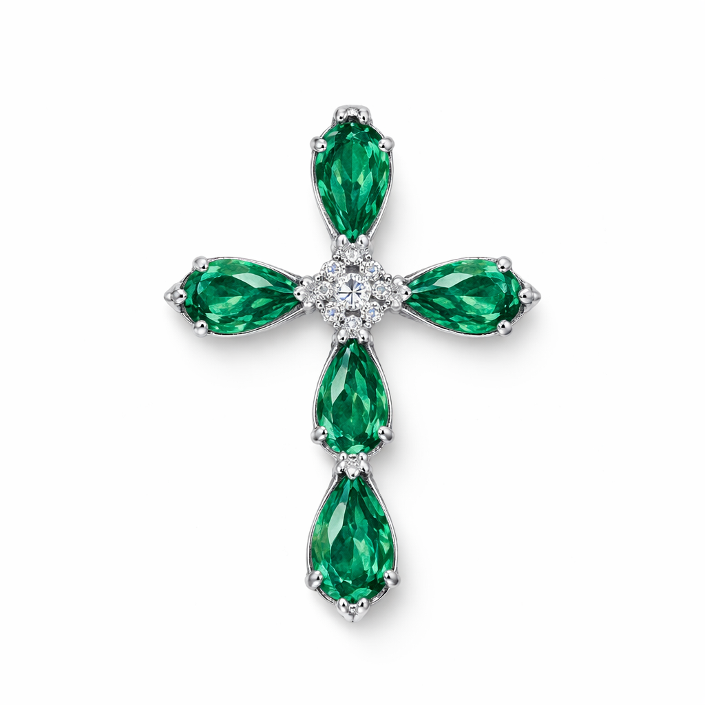 Pear cut Emerald white gold cross and with simple diamond accent stones. Timeless, elegant, and classy. Hidden bail. Light metal work. No double prongs