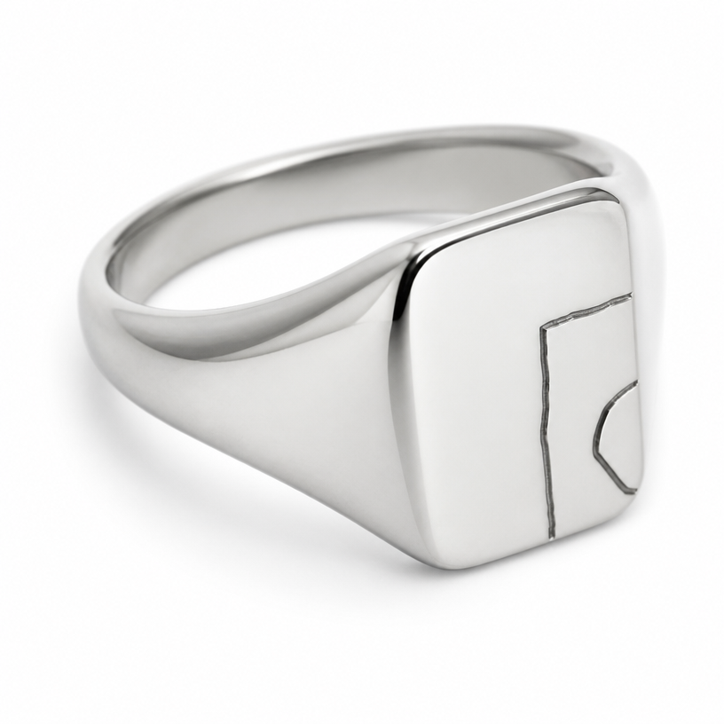 A women's ring made of silver. this desing on a signet ring
using the attached image as a visual reference, create A women's ring made of silver. this desing on a signet ring. photorealistic, just the design no text