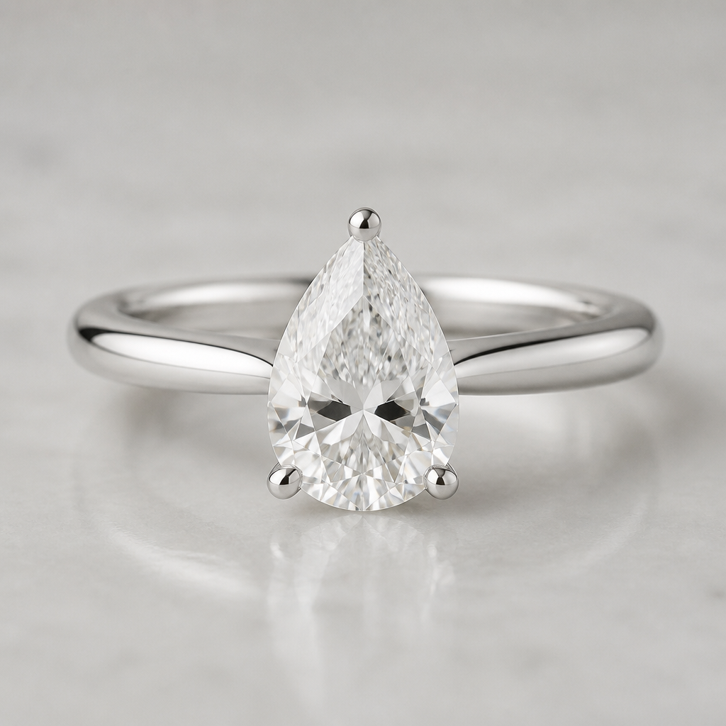 Anello di fidanzamento con brillante a goccia da 1 carato, oro bianco
photorealistic jewelry design, Anello di fidanzamento con brillante a goccia da 1 carato, oro bianco , diamond style, just the design no text