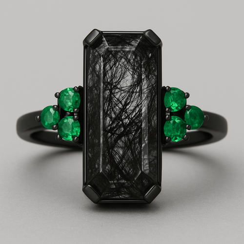 Black band, long hexagon cut rutilated black quartz, emerald accent stones 3 on each side in a cluster 
