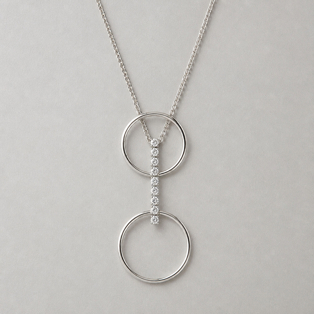 A women's pendant made of silver. collier avec 2 cercles fin, sans diamand, relié par une ligne de diamands qui entre legerement dans les cercles
photorealistic jewelry design, A women's pendant made of silver. collier avec 2 cercles fin, sans diamand, relié par une ligne de diamands qui entre legerement dans les cercles, modern style, just the design no text