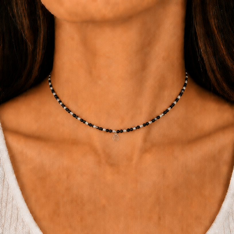 now design this necklace with silver spacers in the form of balls the same size as the black tourmaline
edit the attached jewelry design with these instructions: now design this necklace with silver spacers in the form of balls the same size as the black tourmaline. keep it photorealistic, just the design no text