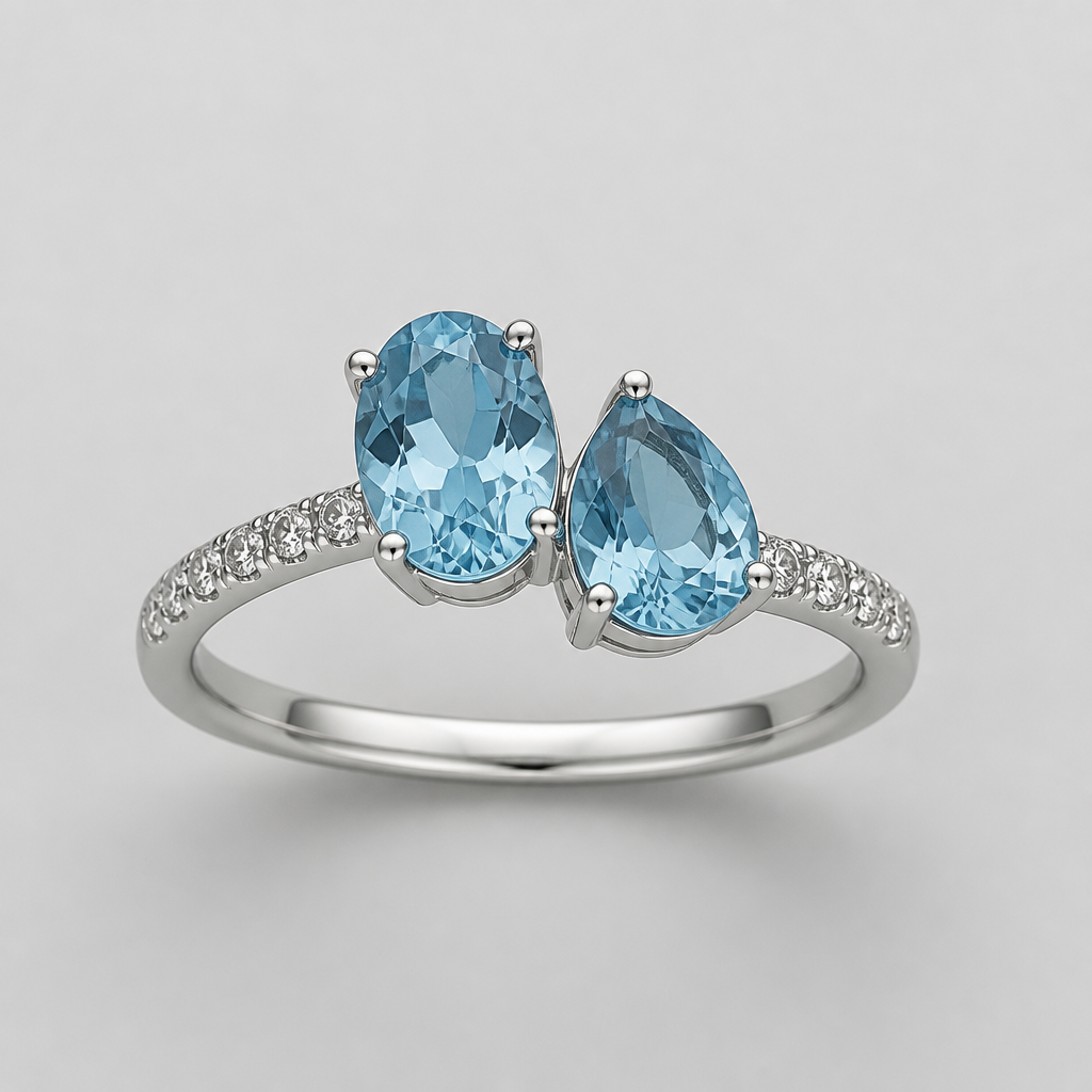 A ring design with one oval blue topaz and one pear blue topaz incorporating small diamonds into the band
photorealistic jewelry design, A ring design with one oval blue topaz and one pear blue topaz incorporating small diamonds into the band, minimalist style, just the design no text