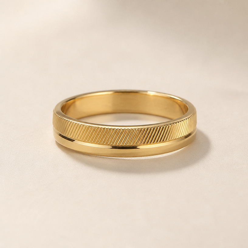 A minimalist women's ring made of gold
using the attached image as a visual reference, create A minimalist women's ring made of gold. photorealistic, just the design no text