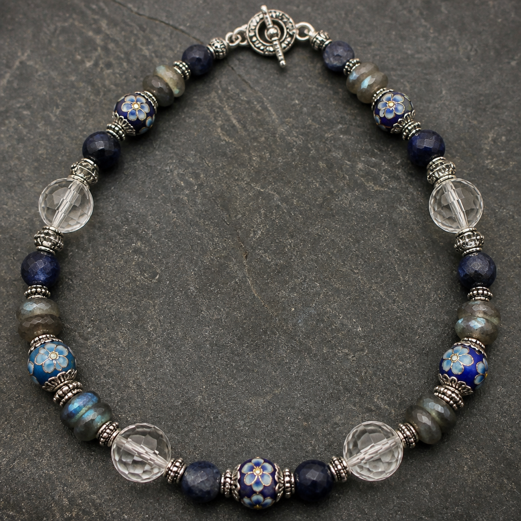 "Blue floral milefiori beads 8mm, labradorite faceted rondels 8mm x 3mm, Sapphire rough cut round beads 8mm beads. Clear faceted crystal quartz 10mm beads silver findings necklace "
photorealistic jewelry design, "Blue floral milefiori beads 8mm, labradorite faceted rondels 8mm x 3mm, Sapphire rough cut round beads 8mm beads. Clear faceted crystal quartz 10mm beads silver findings necklace ", vintage style, just the design no text