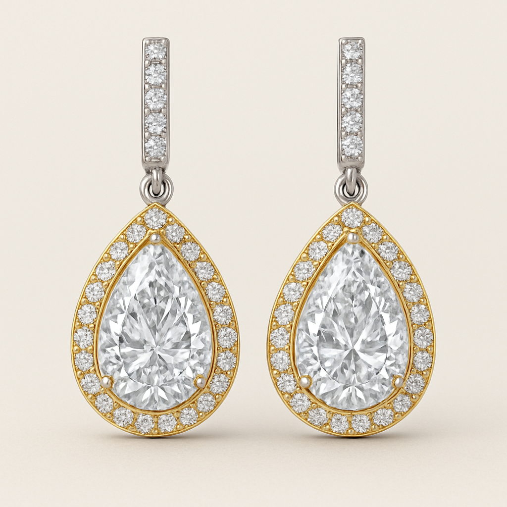 A pear shaped lab grown diamond eraings in white gold a gold borders 