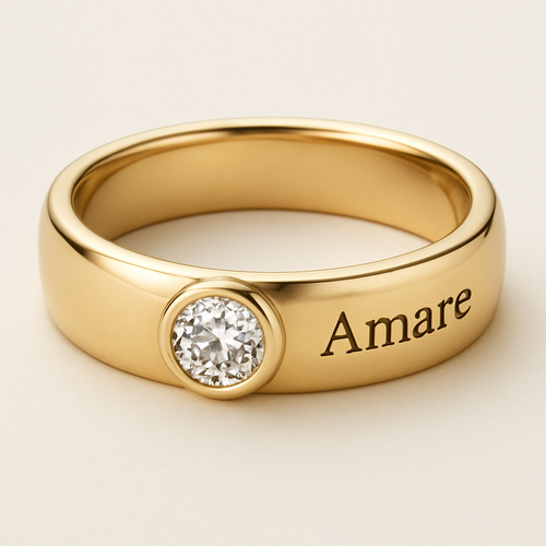 Gold wedding ring with gold diamond and in grave Amare on the side of the ring 