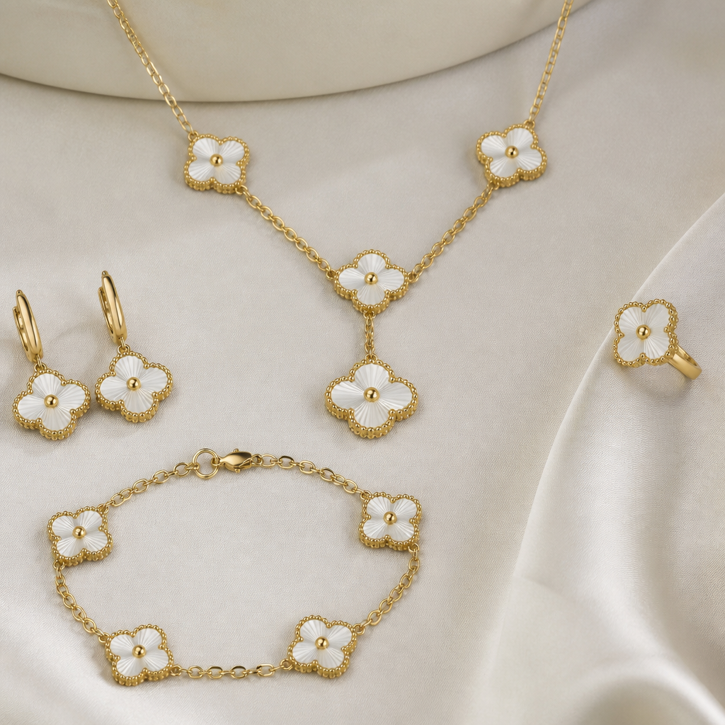 A modern women's necklace made of gold, detailed and decorative, moderately ornate. make earrings and braselet and ring with it in the same design and make it in Van Cleef beand style
photorealistic jewelry design, A modern women's necklace made of gold, detailed and decorative, moderately ornate. make earrings and braselet and ring with it in the same design and make it in Van Cleef beand style, modern style, just the design no text