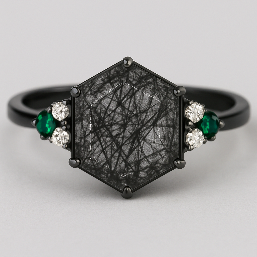 Skinny medium length Hexagon cut Black rutilated quartz with 1 emerald on each side and 2 moissanite on each side accent stones in a cluster on a black band