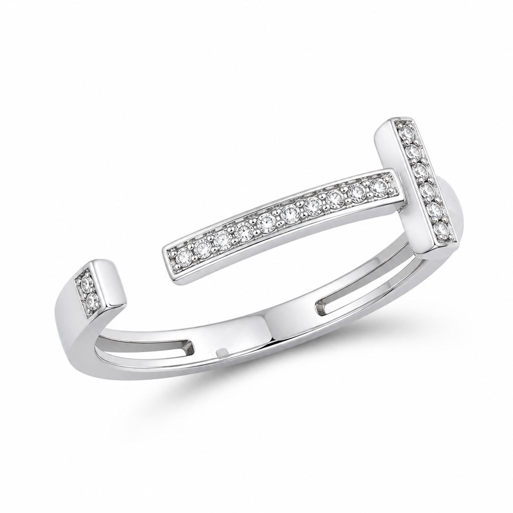 A modern women's ring made of silver with diamond stones. Un bague comme l'image de référence, mais enlever l'anneau du dessus identifier avec du crayon rouge
photorealistic jewelry design, A modern women's ring made of silver with diamond stones. Un bague comme l'image de référence, mais enlever l'anneau du dessus identifier avec du crayon rouge, modern style, just the design no text