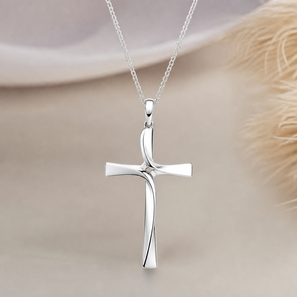A modern women's pendant made of silver suitable for daily wear. An extraordinary excellent beautiful delicate and elegant, super modern Cross.
photorealistic jewelry design, A modern women's pendant made of silver suitable for daily wear. An extraordinary excellent beautiful delicate and elegant, super modern Cross., modern style, just the design no text